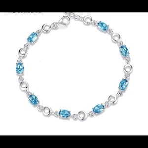 Aqua blue topaz silver bracelet